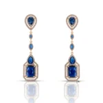 Bijoux Suisses Gisoo Jewels Boucles d'oreilles Royal Saphir - ELEGANCE 56, des pendants en cuivre environnemental plaqué or 18 carats, ornés de pierres de saphir bleu CZ