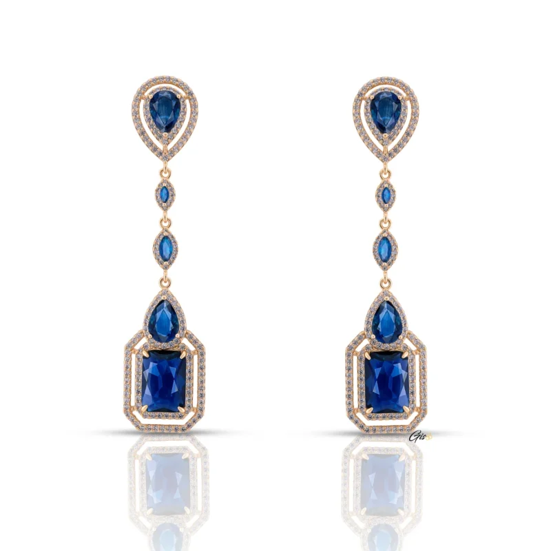 Bijoux Suisses Gisoo Jewels Boucles d'oreilles Royal Saphir - ELEGANCE 56, des pendants en cuivre environnemental plaqué or 18 carats, ornés de pierres de saphir bleu CZ